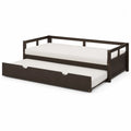 Lit gigogne en bois brun avec matelas